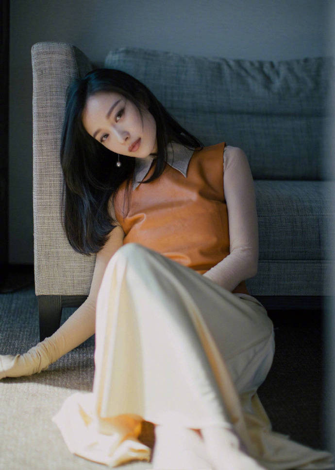 南京明星倪妮春夏清新暖橘色写真图片