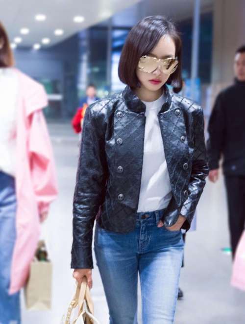 山东明星宋茜黑超加面亮相上海机场时尚街